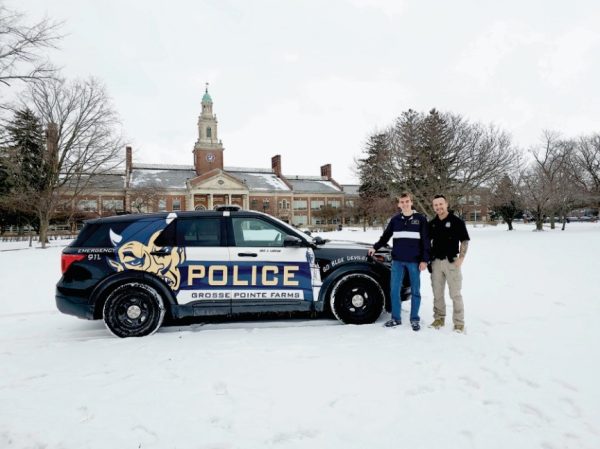 Nate Michaud '25 on the left, Officer Jim LaBeau on the right.